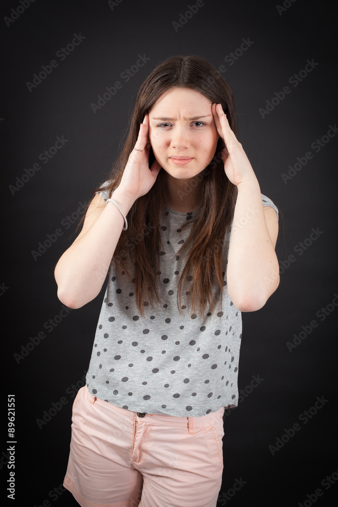 beautiful woman doing different expressions in different sets of clothes: headache