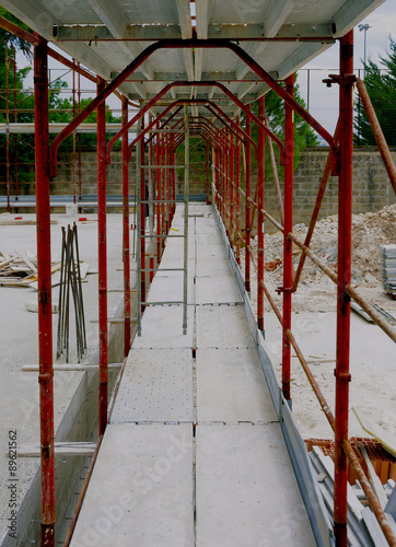 scaffolds manufactured for the construction of a new building #89621562