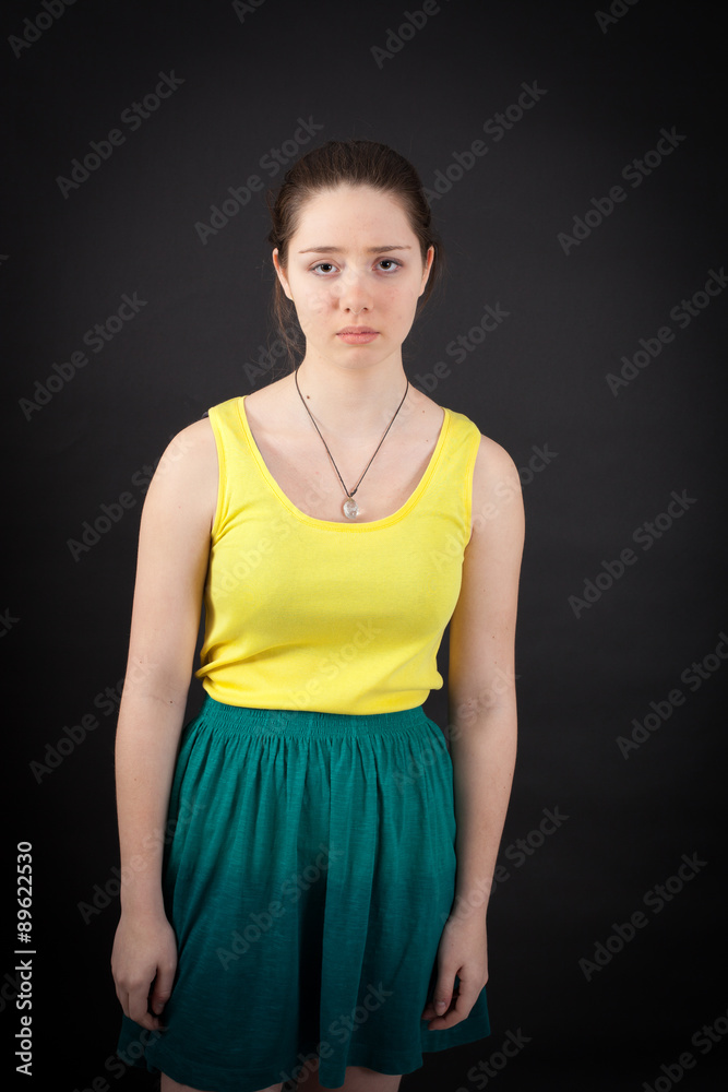 beautiful woman doing different expressions in different sets of clothes: sad beautiful woman doing different expressions in different sets of clothes: sad