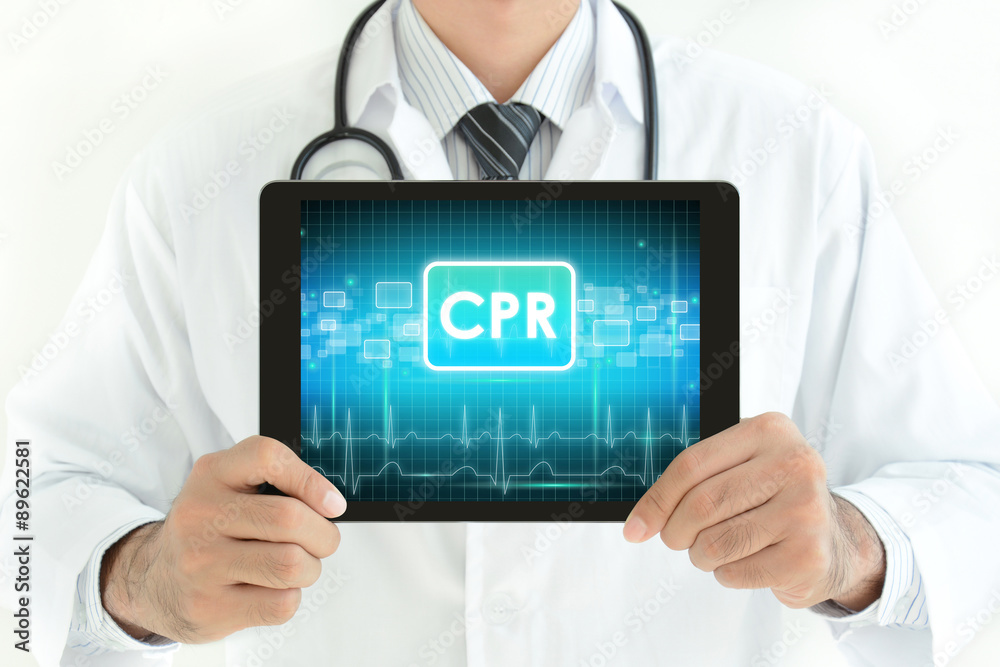 Doctor holding tablet pc with CPR sign on screen Doctor holding tablet pc with CPR sign on screen