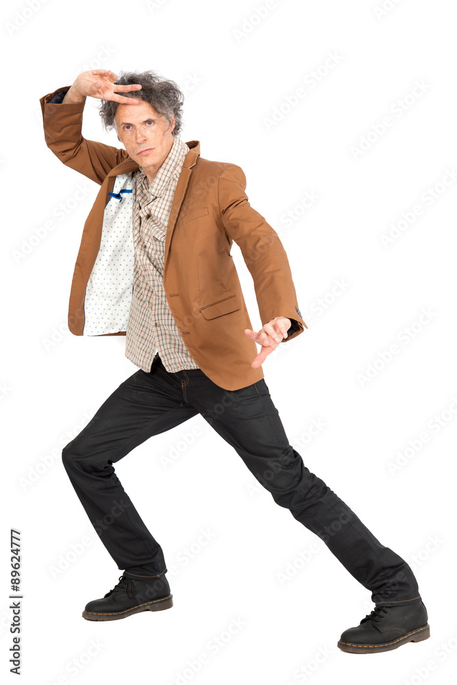 Fototapeta premium Handsome man doing different expressions in different sets of clothes: posing