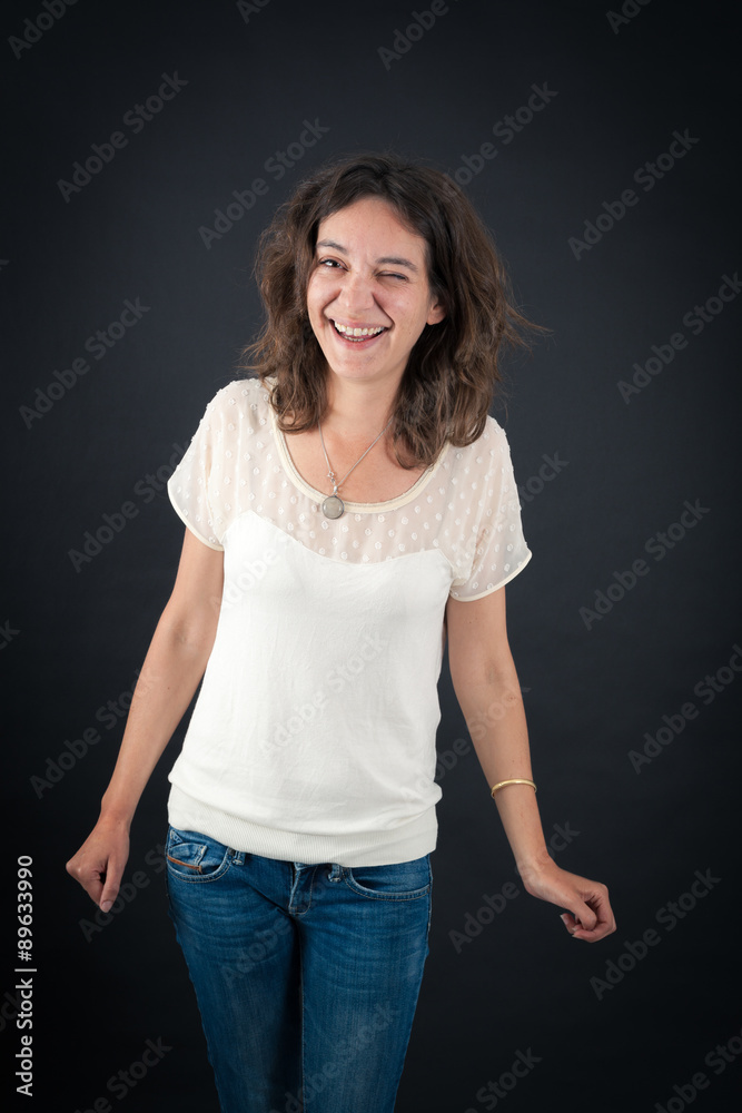 Beautiful woman doing different expressions in different sets of clothes: blinking Beautiful woman doing different expressions in different sets of clothes: blinking
