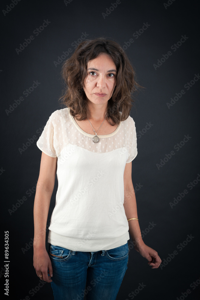 Beautiful woman doing different expressions in different sets of clothes: angry Beautiful woman doing different expressions in different sets of clothes: angry
