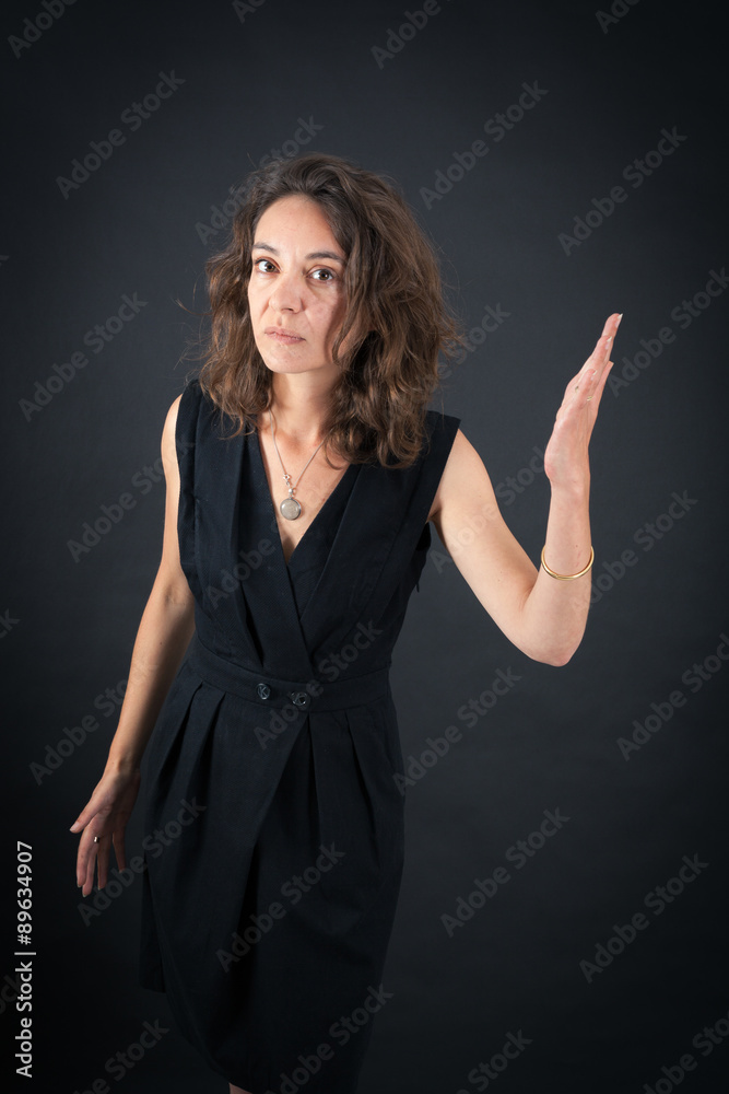 Beautiful woman doing different expressions in different sets of clothes: be careful Beautiful woman doing different expressions in different sets of clothes: be careful
