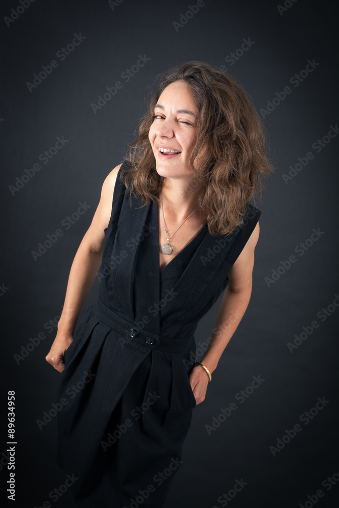 Beautiful woman doing different expressions in different sets of clothes: blinking Beautiful woman doing different expressions in different sets of clothes: blinking