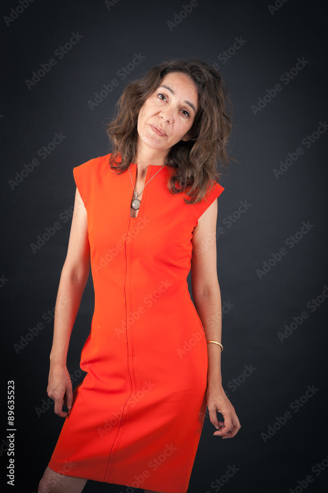 Fototapeta premium Beautiful woman doing different expressions in different sets of clothes: bored