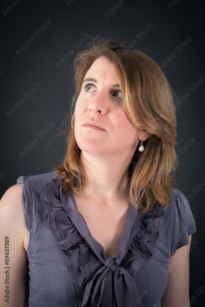 Beautiful woman doing different expressions in different sets of clothes: thinking Beautiful woman doing different expressions in different sets of clothes: thinking