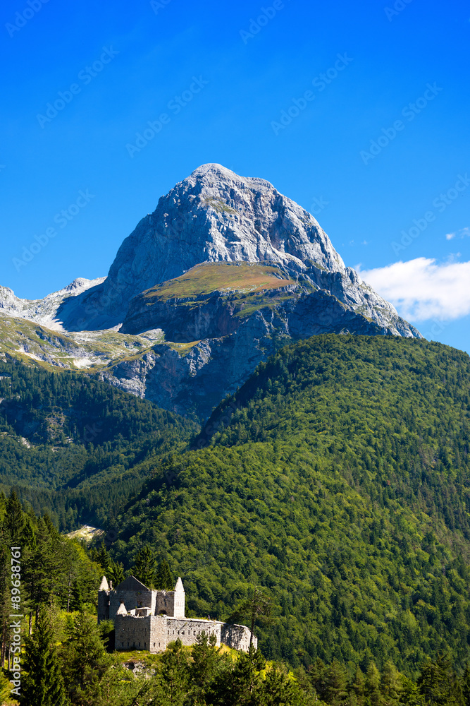 Peak of Mangart - Border Italy Slovenia / Rocky peak of Mount Mangart (2679 m), Julian Alps, seen from the Slovenian border. In the Triglav National Park, Slovenia, Europe