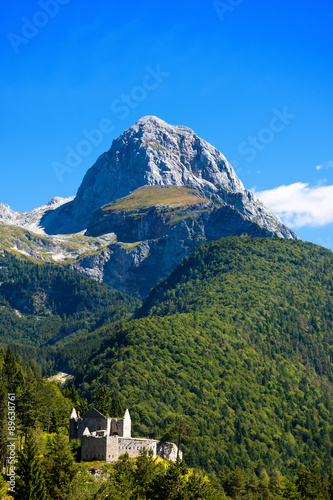 Peak of Mangart - Border Italy Slovenia / Rocky peak of Mount Mangart (2679 m), Julian Alps, seen from the Slovenian border. In the Triglav National Park, Slovenia, Europe