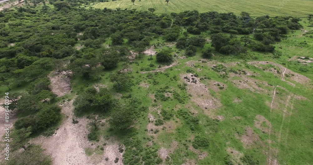 Aerial view flying up over Tanzania Landscape. Africa. Travel tourism adventure from bird eye view. Aerial view flying up over Tanzania Landscape. Africa. Travel tourism adventure from bird eye view.