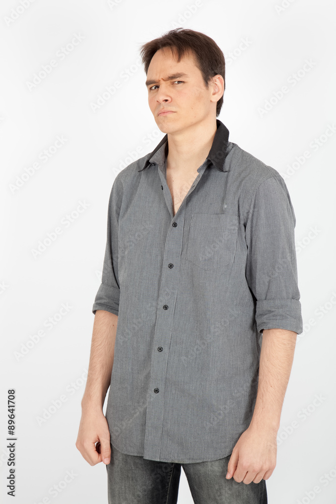 handsome man doing different expressions in different sets of clothes: angry handsome man doing different expressions in different sets of clothes: angry