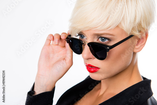 Canvas Print successful beautiful young woman with red lips and sunglasses