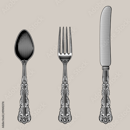 Antique Cutlery. Vector spoon, fork and knife in vintage style from the Victorian period. Works well as a wall stickers.