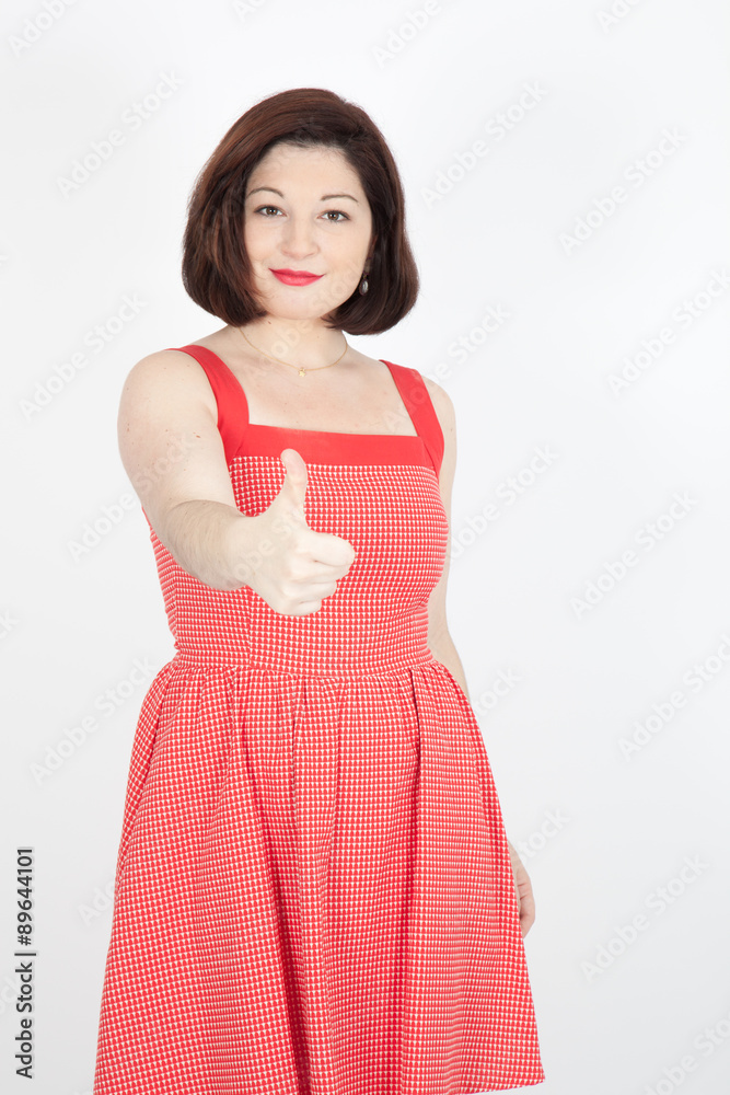 Beautiful woman doing different expressions in different sets of clothes: thumbs up Beautiful woman doing different expressions in different sets of clothes: thumbs up