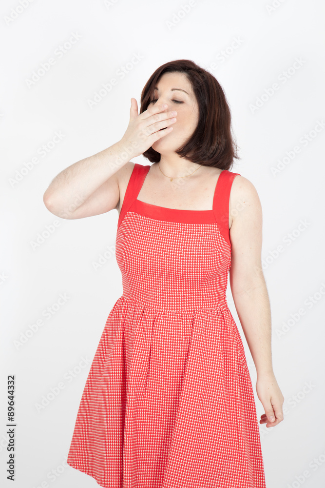 Beautiful woman doing different expressions in different sets of clothes: yawning Beautiful woman doing different expressions in different sets of clothes: yawning