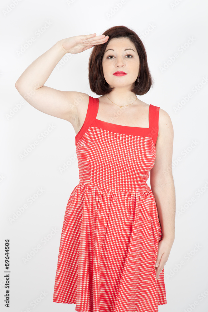 Beautiful woman doing different expressions in different sets of clothes: at attention Beautiful woman doing different expressions in different sets of clothes: at attention