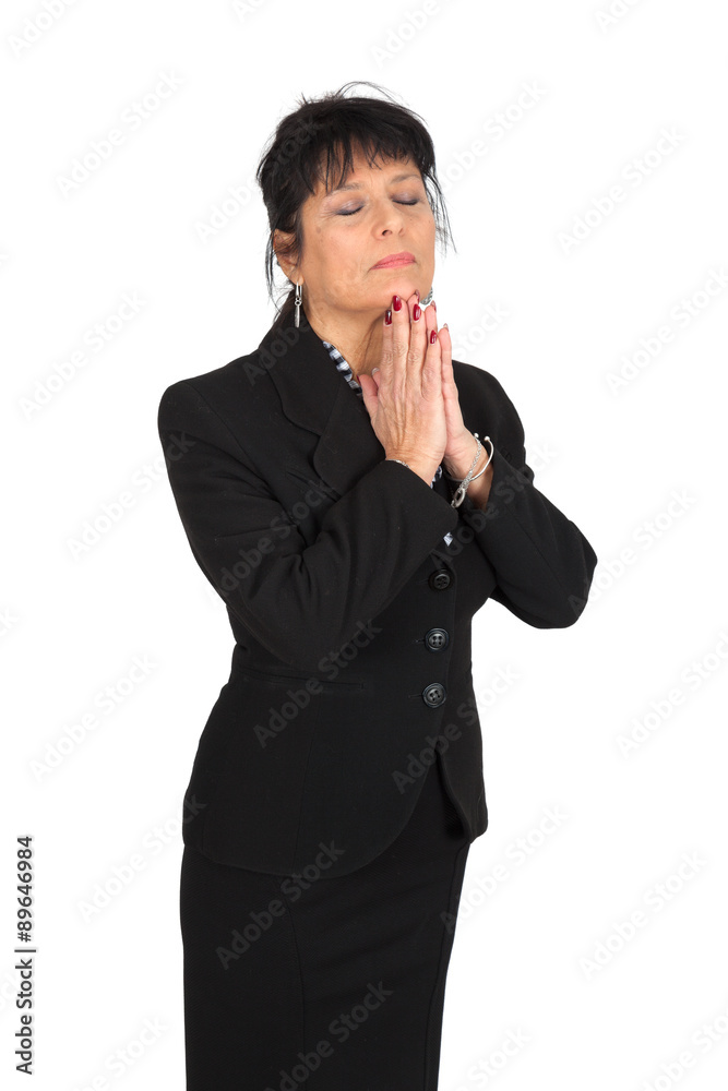 Beautiful woman doing different expressions in different sets of clothes: prayer Beautiful woman doing different expressions in different sets of clothes: prayer
