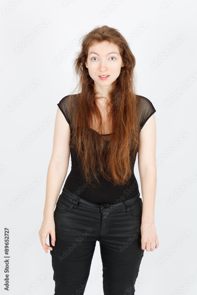 Beautiful businesswoman doing different expressions in different sets of clothes: good surprise Beautiful businesswoman doing different expressions in different sets of clothes: good surprise