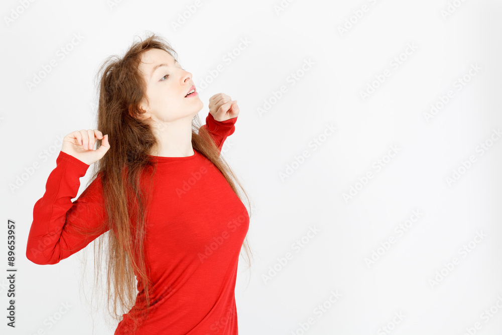 Beautiful businesswoman doing different expressions in different sets of clothes: waking up Beautiful businesswoman doing different expressions in different sets of clothes: waking up