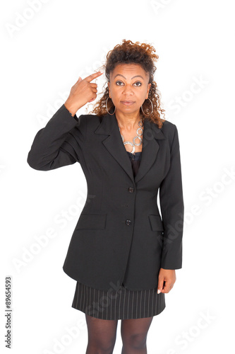 Beautiful black businnesswoman doing different expressions in different sets of clothes photo