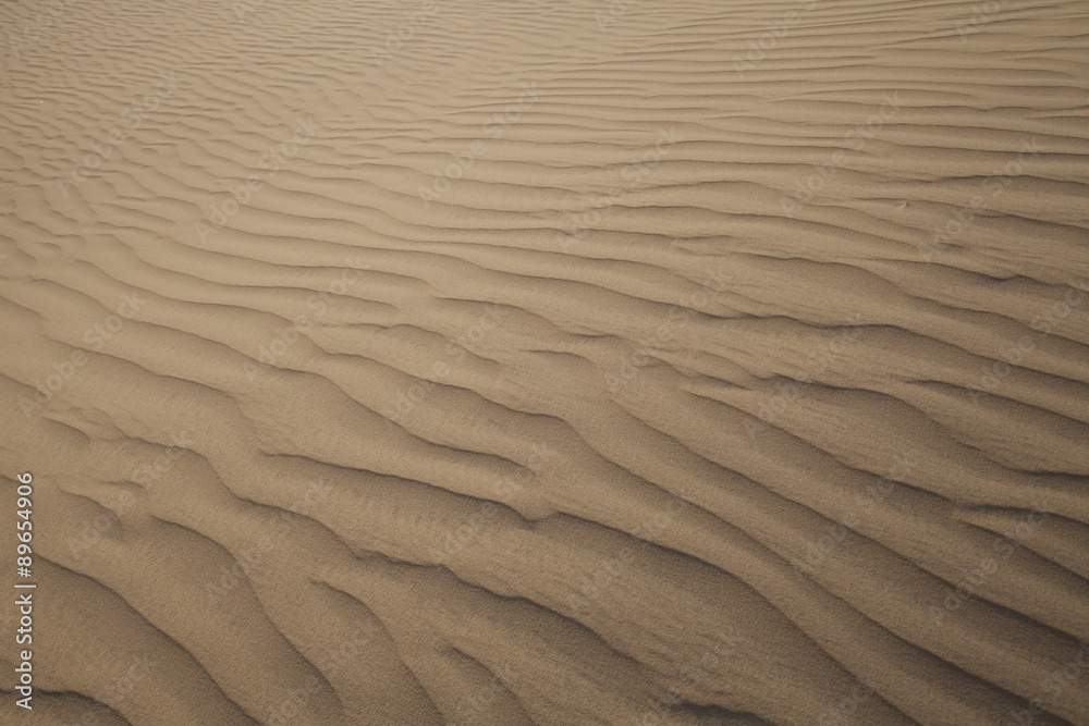 Waves of sand texture on a sand dune in Fayoum desert, Egypt Waves of sand texture on a sand dune in Fayoum desert, Egypt