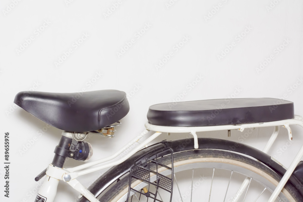 The bicycle saddle on white background.
The bicycle saddle on white background.