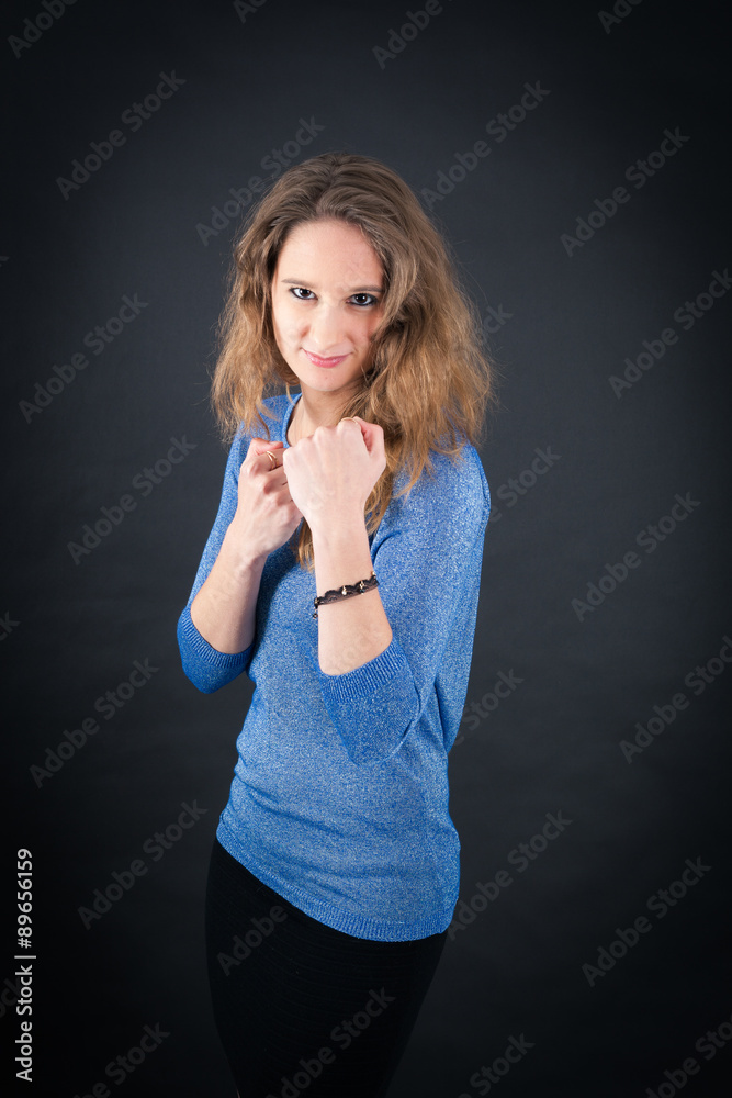 Beautiful woman doing different expressions in different sets of clothes: boxe