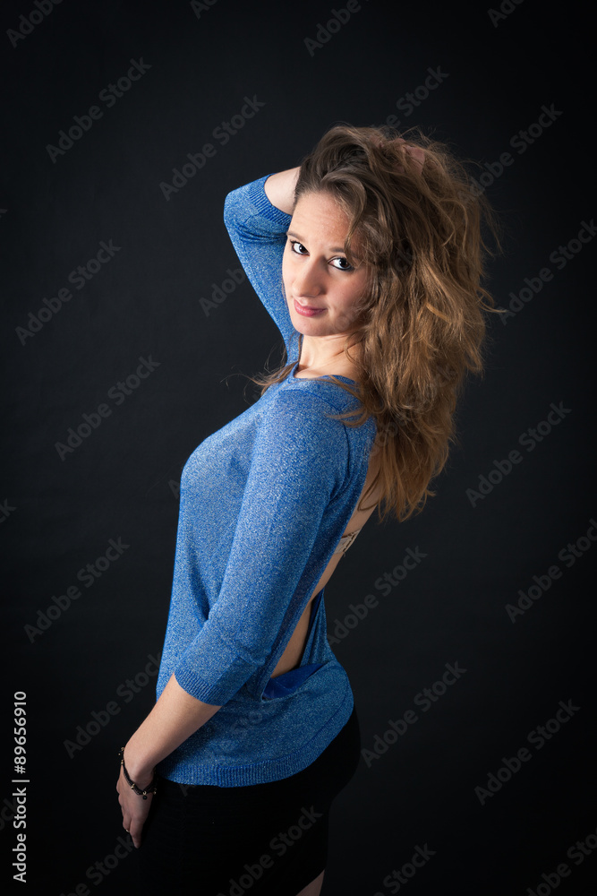 Beautiful woman doing different expressions in different sets of clothes: posing Beautiful woman doing different expressions in different sets of clothes: posing