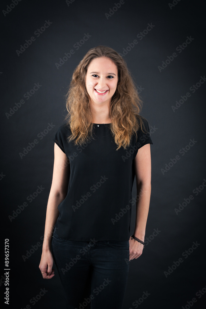 Beautiful woman doing different expressions in different sets of clothes: smile Beautiful woman doing different expressions in different sets of clothes: smile