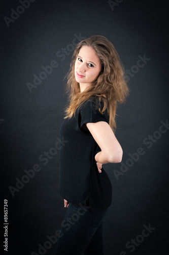Beautiful woman doing different expressions in different sets of clothes: backache