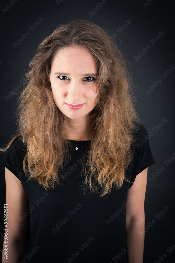 Beautiful woman doing different expressions in different sets of clothes: angry