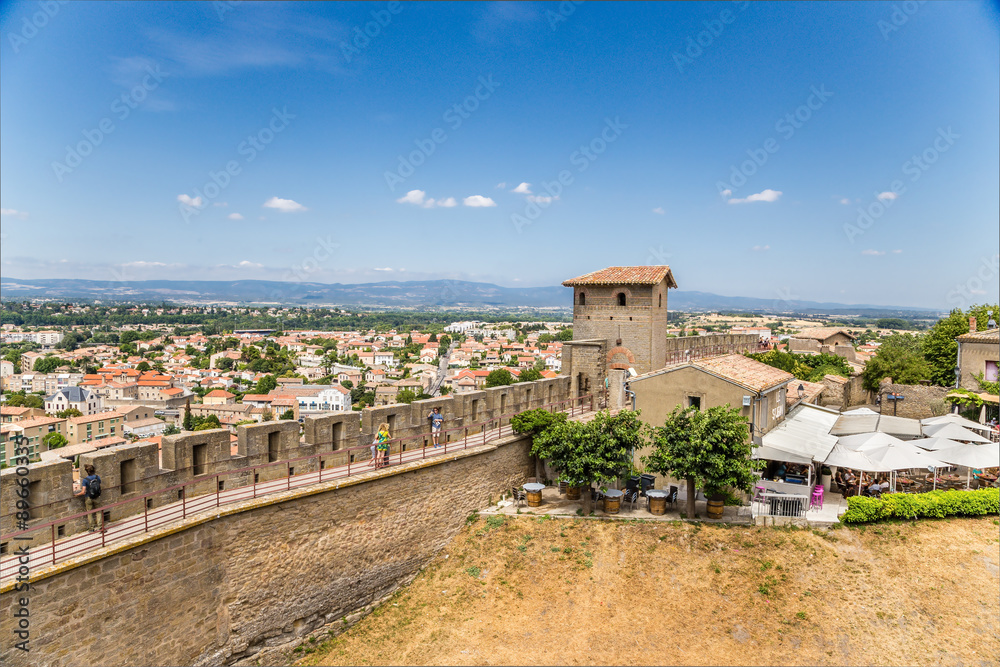 Carcassonne. France. Landscape with ramparts, towers and a view of the lower town