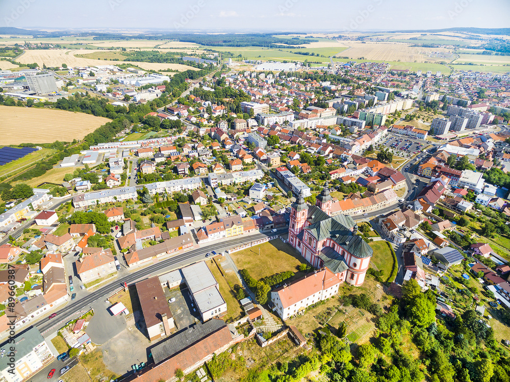 Aerial view to Prestice town with rare baroque church of The Assumption (Nanebevzeti Pany Marie) buildt  in 1775.