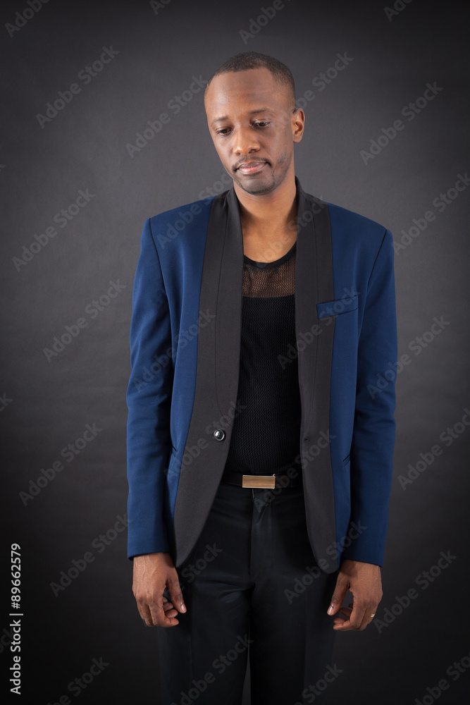 Fototapeta premium Handsome man doing different expressions in different sets of clothes: sad
