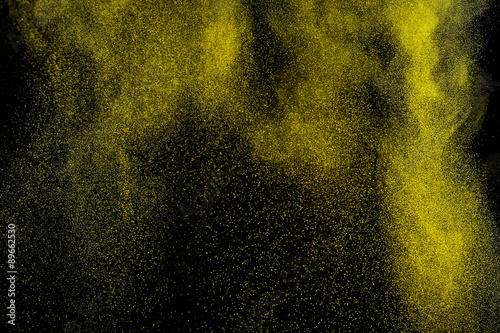 Abstract yellow and gold paint Holi.