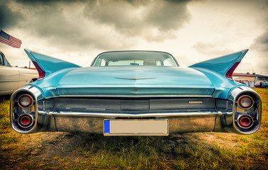 Fotobehang Snelle auto Amerikaanse oldtimer in vintage sfeer  © lukaszimilena