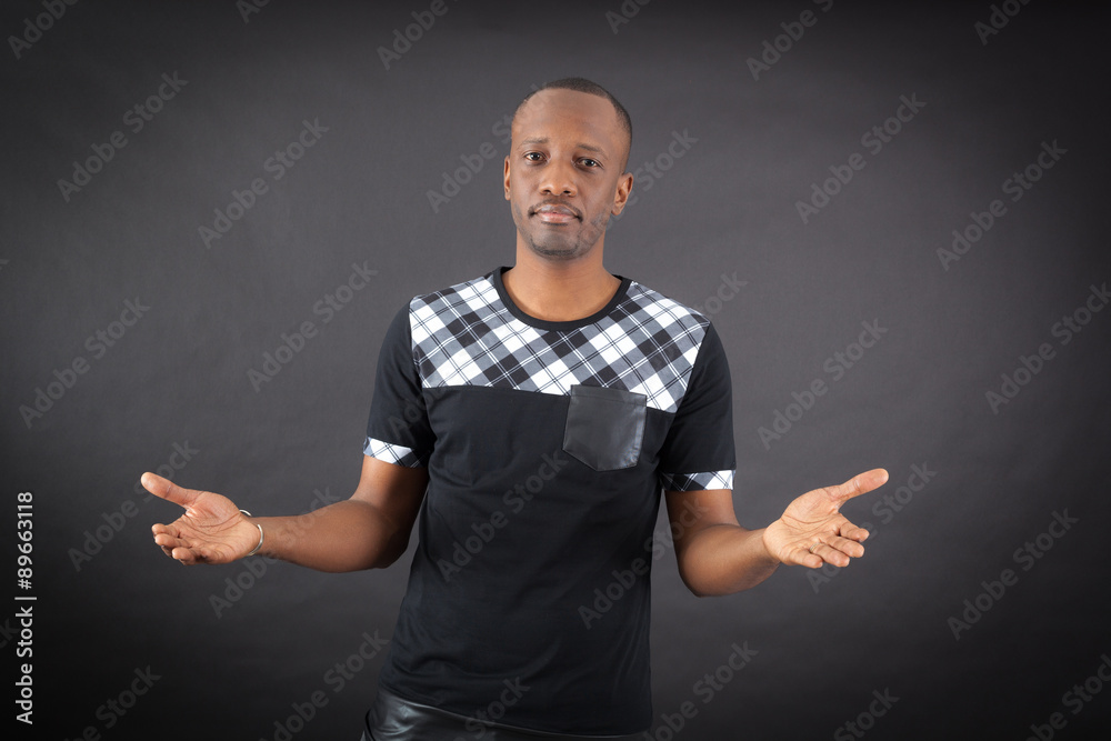 Handsome man doing different expressions in different sets of clothes: welcome