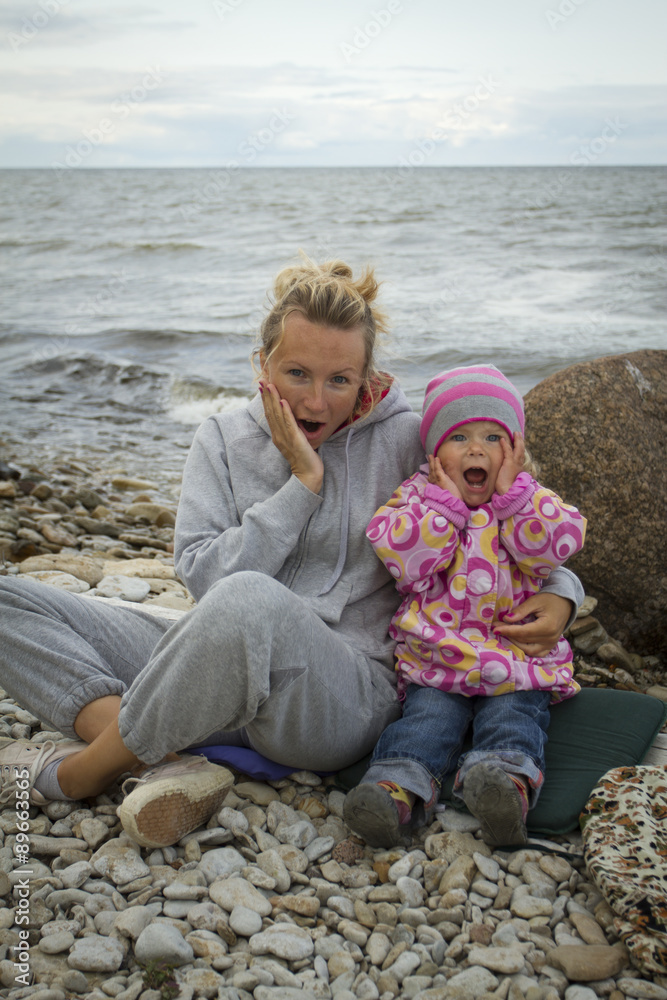 mother and daughter at the sea