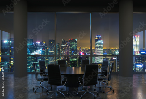 Panoramic conference room in modern office, cityscape of Singapore skyscrapers at night. Black chairs and a black round table. 3D rendering.