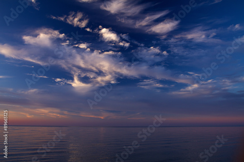 sunset on the sea. © Aliaksei