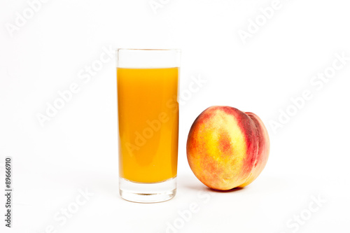  Peach juice on a white background.