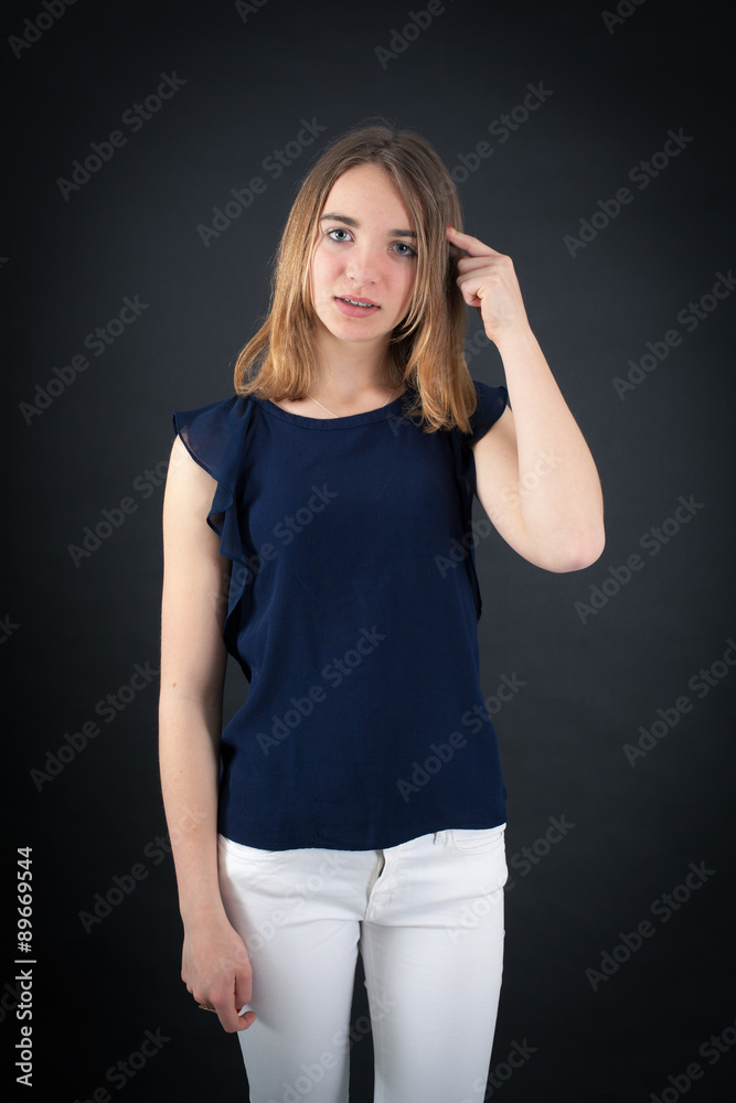 Fototapeta premium Beautiful woman doing different expressions in different sets of clothes: you are crazy