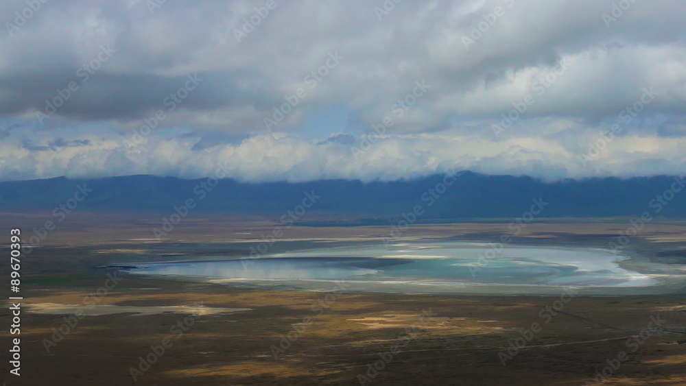 Serengeti Ngorongoro crater static camera aerial view. Africa. Tanzania. Travel tourism adventure in wild animal nature. Serengeti Ngorongoro crater static camera aerial view. Africa. Tanzania. Travel tourism adventure in wild animal nature.