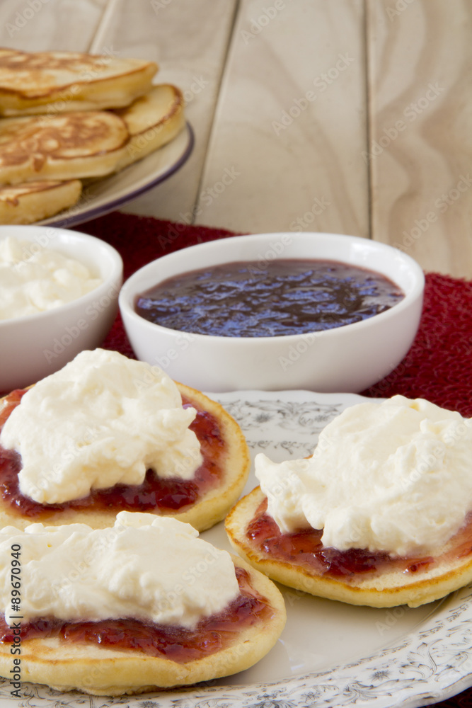 Plate of Piklets with Jam and Cream Close Up Plate of Piklets with Jam and Cream Close Up