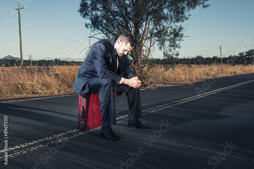 Concept: A frustrated business man is leaving the corporate lifestyle and chasing freedom in the outback of Queensland, Australia. Cinematic Portrait Style.