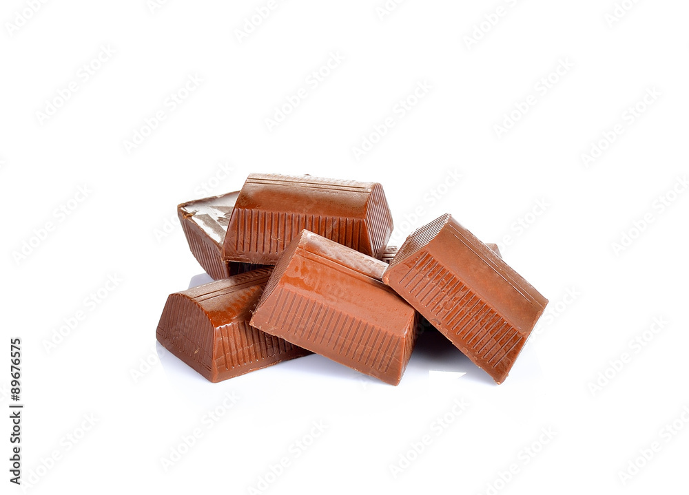 chocolate pieces on white background chocolate pieces on white background