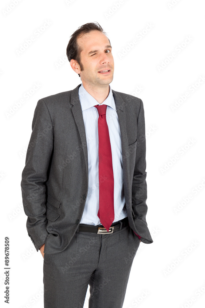 Handsome businessman doing different expressions in different sets of clothes: blinking Handsome businessman doing different expressions in different sets of clothes: blinking