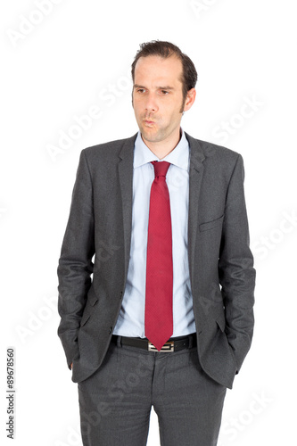 Handsome businessman doing different expressions in different sets of clothes: bored