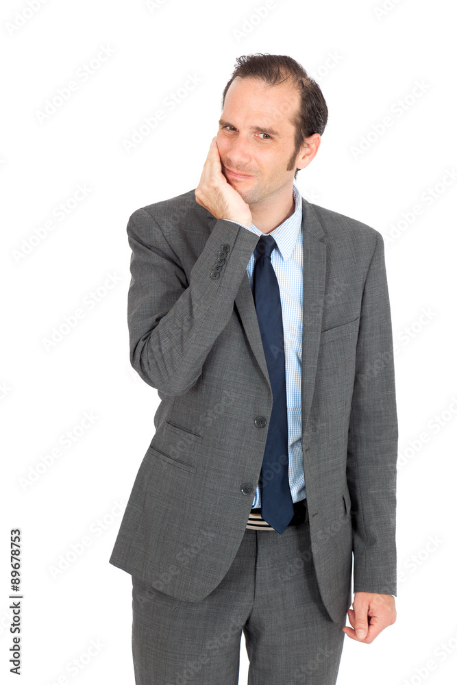 Handsome businessman doing different expressions in different sets of clothes: toothache Handsome businessman doing different expressions in different sets of clothes: toothache