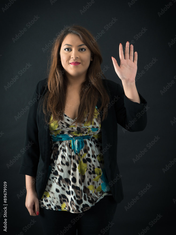 Beautiful woman doing different expressions in different sets of clothes: waving